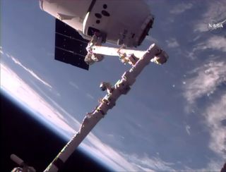 SpaceX's 11th cargo resupply mission arrives at the International Space Station, where NASA astronaut Peggy Whitson and Jack Fischer operated the robotic Canadarm2 to grapple the spacecraft.