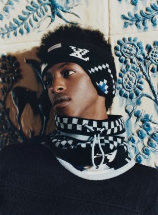 Boy in Louis Vuitton ski headband and snood