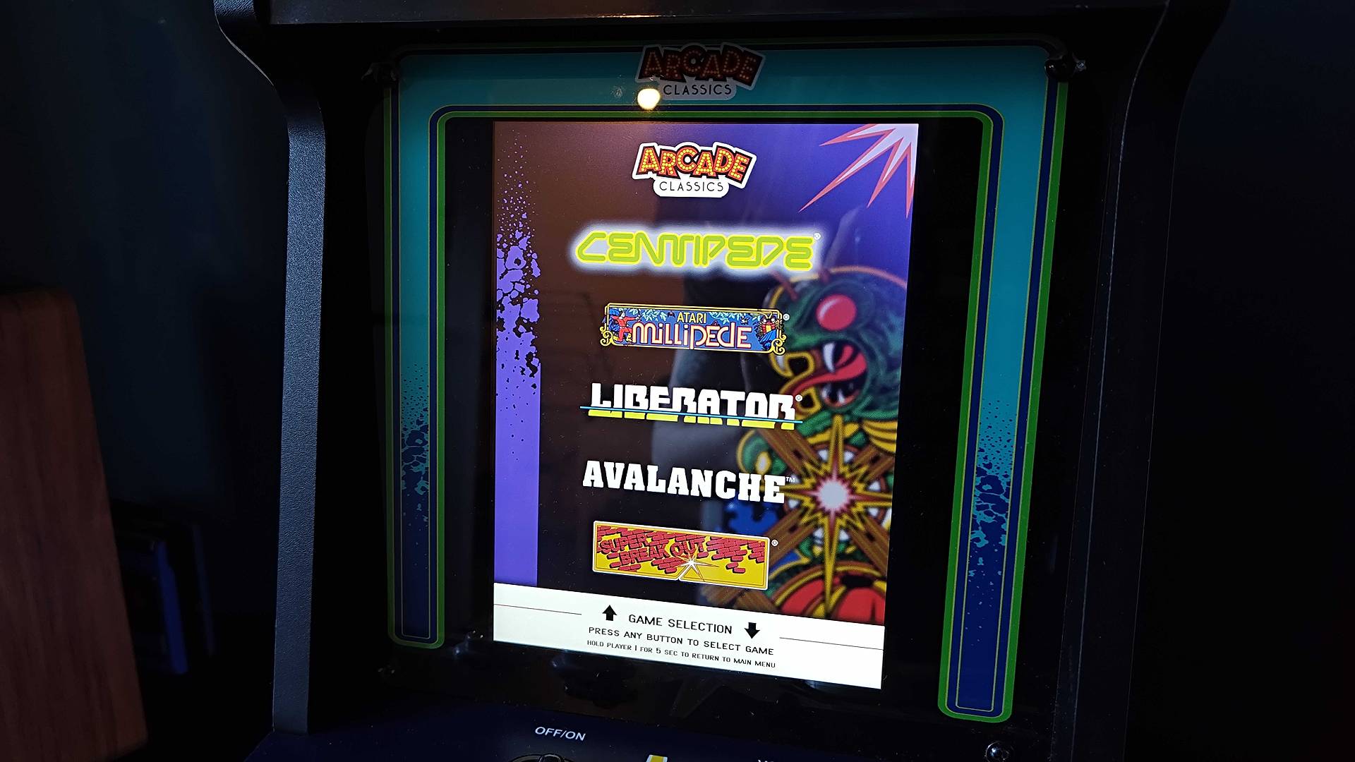 Close up of Arcade Classics Centipede screen with game menu.