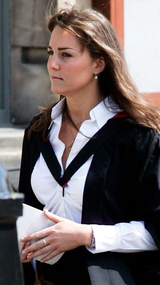 New graduate Kate Middleton wears a traditional gown to the graduation ceremony at St Andrew's University to collect her degree in St Andrew's on June 23, 2005, England.
