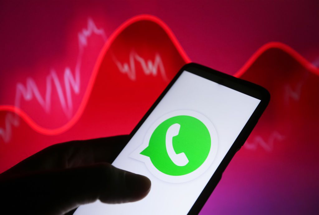 In this photo illustration, a WhatsApp logo is seen on a smartphone screen.