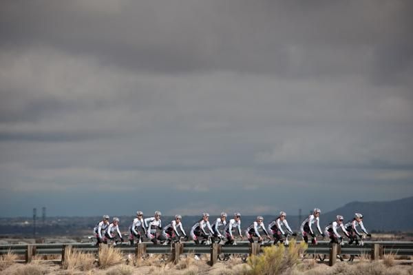 The UnitedHealthcare team ride beneath grey skies in Arizona.