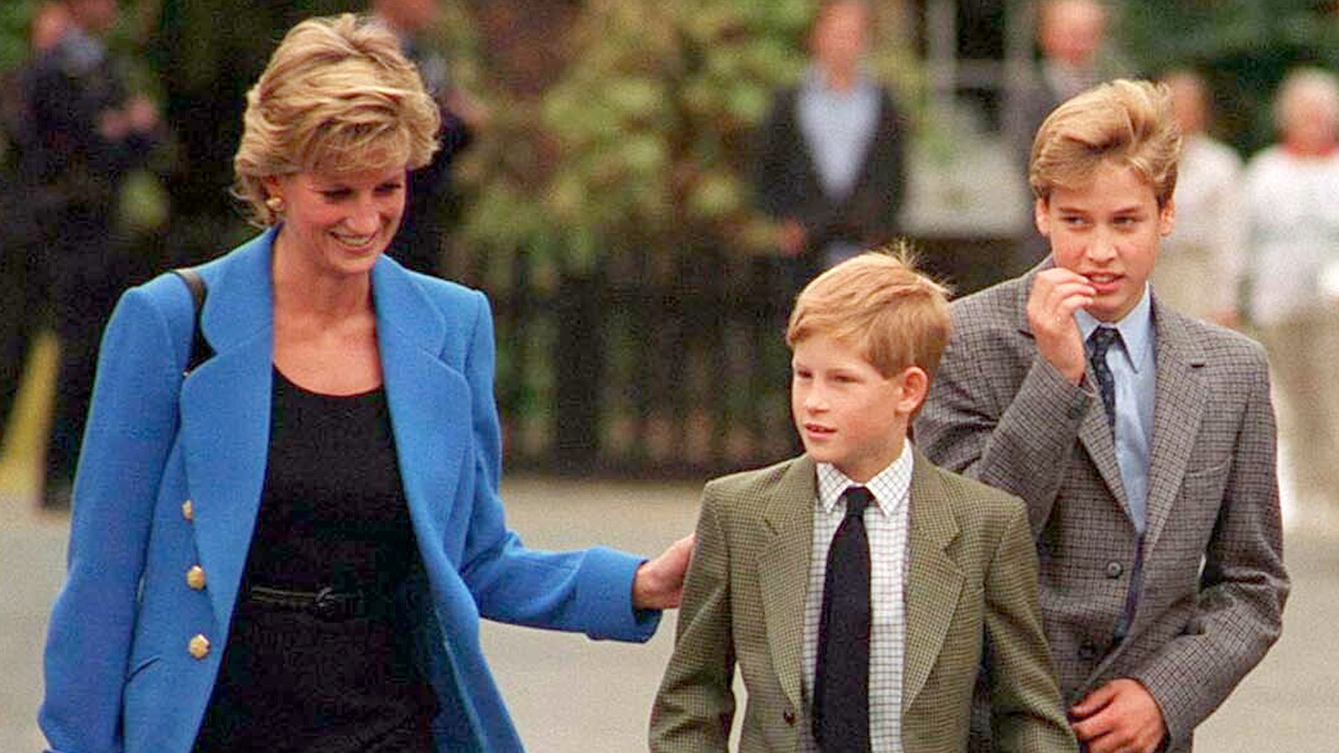 Prince William with Diana, Princess of Wales and Prince Harry on the day he joined Eton in September 1995. (Photo by Anwar Hussein/WireImage)