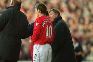 Manchester United manager Sir Alex Ferguson prepares to send on Teddy Sheringham in an FA Cup game against Fulham in January 2001.