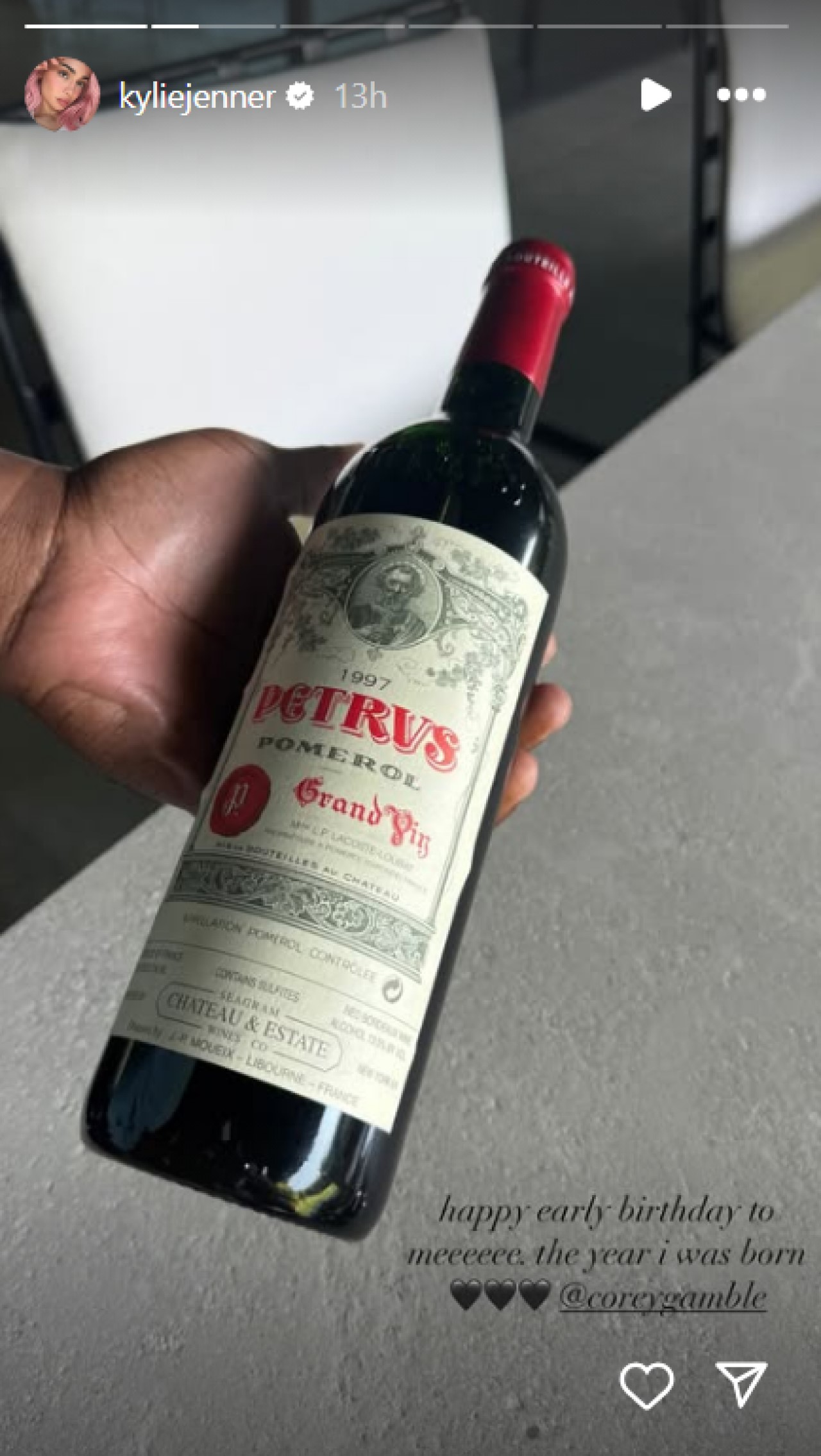Kylie Jenner shows off bottles of wine from the year she was born on Instagram Stories.