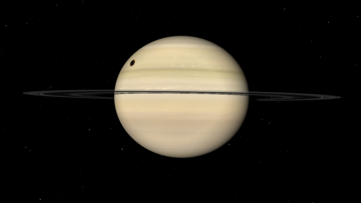 A representation of Saturn showing the location of Titan's shadow moving across the surface at the beginning of a transit.