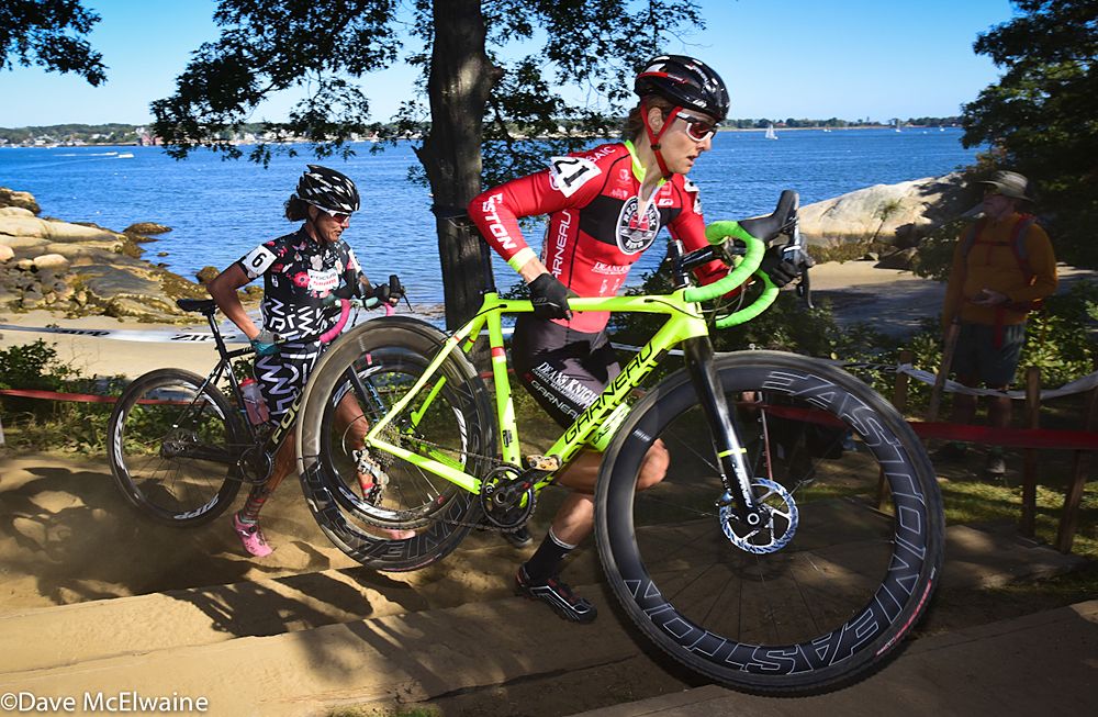 Natasha Elliot (Red Truck Garneau) running a small set of stairs followed by Nicole Duke (SRAM)