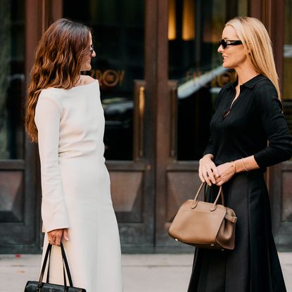 A street-style photo taken in New York showing summer-to-fall transitional outfits.