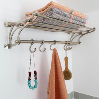 bathroom with towels rack and towels