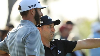 Dustin Johnson and Sergio Garcia at the 2019 Players Championship with Adidas logos displayed on their shirts
