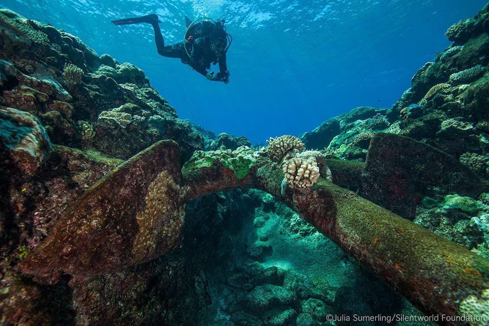 James Hunter, an archaeologist with the Australian National Maritime Museum, records an anchor from one of the wrecks at Kenn Reefs with a photogrammetry camera.