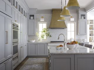 Kitchen with gray cabinets and island