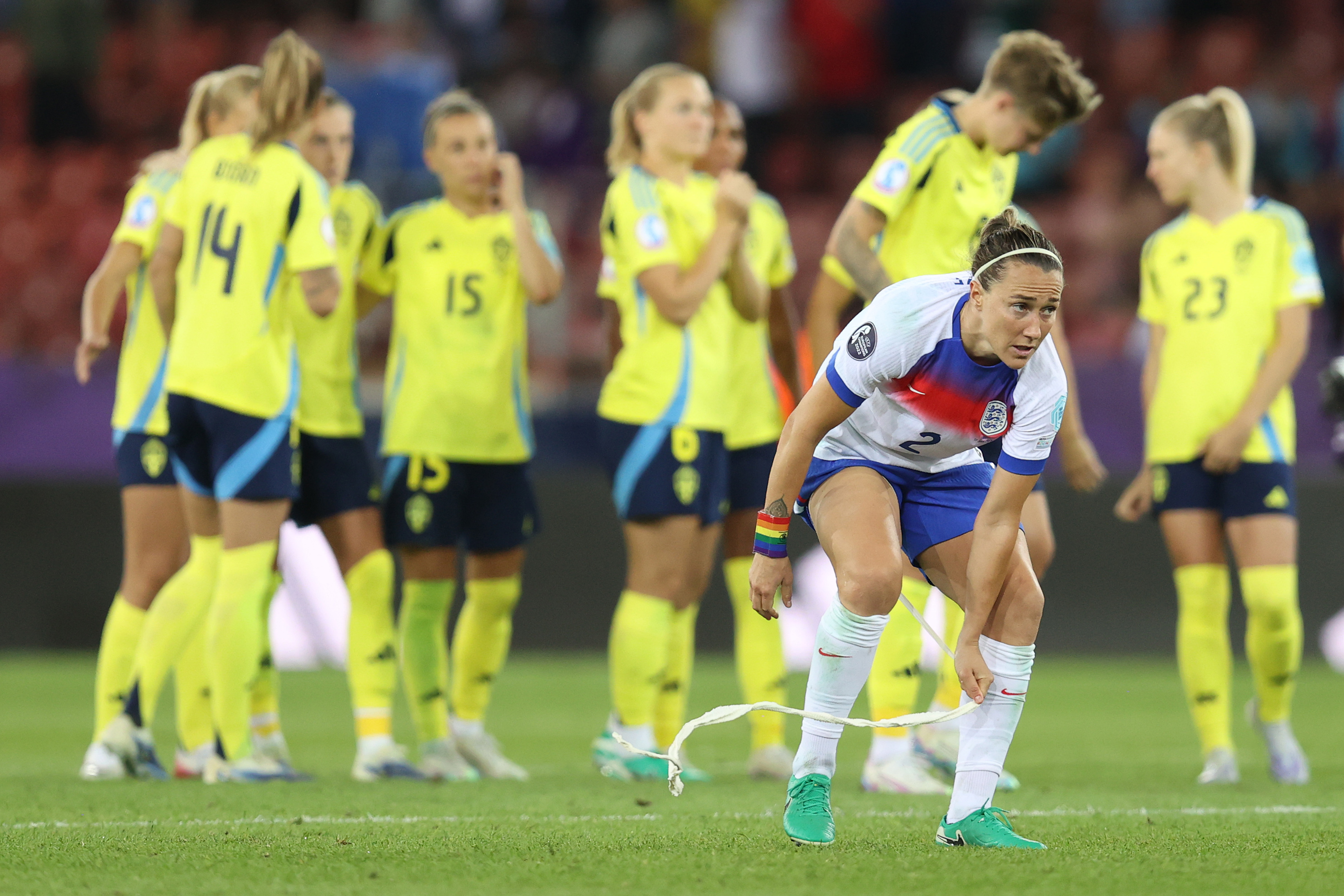 ZURICH, SWITZERLAND - JULY 17: Lucy Bronze of England unwraps a bandage from her leg as she steps up tot take a penalty during the shoot-out during the UEFA Womens EURO 2025 Quarter-Final match between Sweden and England at Stadion Letzigrund on July 17, 2025 in Zurich, Switzerland.