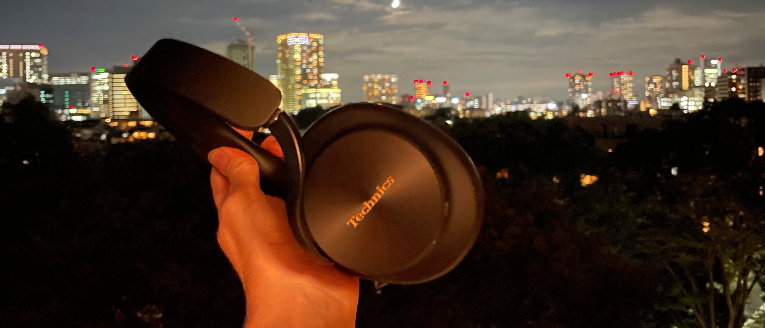Technics EAH-A1000 against a Tokyo skyline