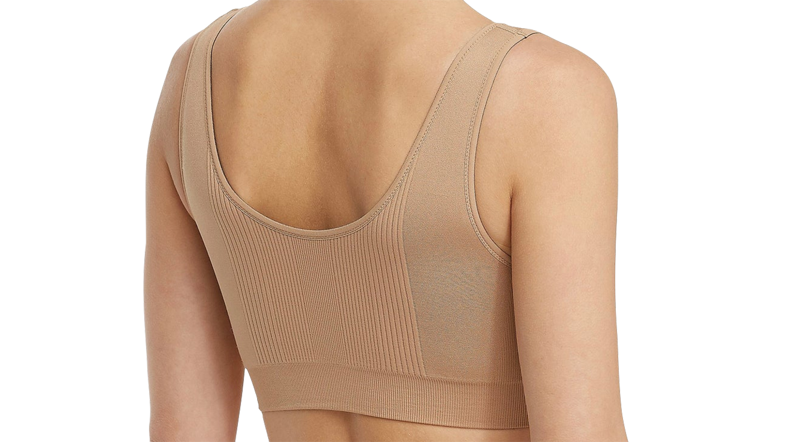 Vista trasera de cerca de una mujer que lleva el sujetador cómodo reversible SPANX Breast of Both Worlds® color nude, uno de los mejores sujetadores de w&h para la grasa de la espalda