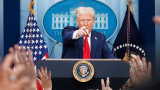 President Donald Trump speaks at a White House press briefing after a Black Hawk helicopter collided with American Airlines flight 5342 by DCA airport.