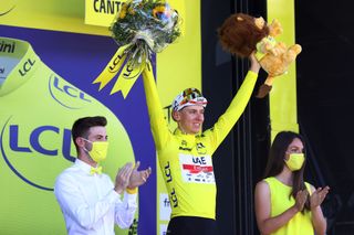 LAUSANNE SWITZERLAND JULY 09 Tadej Pogacar of Slovenia and UAE Team Emirates Yellow Leader Jersey celebrates at podium winner during the 109th Tour de France 2022 Stage 8 a 1863km stage from Dole to Lausanne Cte du Stade olympique 602m TDF2022 WorldTour on July 09 2022 in Lausanne Switzerland Photo by Michael SteeleGetty Images