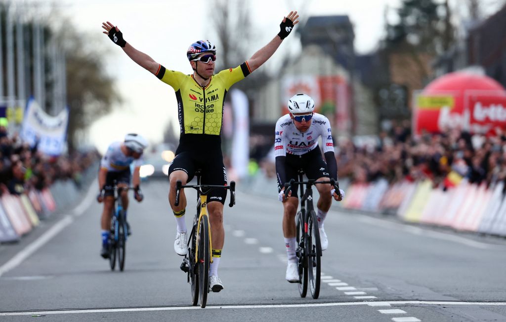 Belgian Wout van Aert of Team Visma-Lease a Bike celebrates after winning celebrates at the finish of the Kuurne-Brussels-Kuurne one day cycling race, 196,4 km from Kuurne to Kuurne via Brussels, Sunday 25 February 2024. BELGA PHOTO DAVID PINTENS (Photo by DAVID PINTENS / BELGA MAG / Belga via AFP)