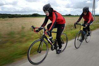 Afghanistans riders Masomah R and Zahra Alizada L take part in a cycling training session on June 28 2017 in Guehenno western FranceMasomah and Zahra Alizada two Afghan refugees passionate about cycling and in danger in their country of origin were welcomed in Brittany by the French family of Thierry Communal Their dreams participate in the Olympic Games in Tokyo in 2020 and become the first Afghan women medallists AFP PHOTO JEANSEBASTIEN EVRARD Photo credit should read JEANSEBASTIEN EVRARDAFP via Getty Images