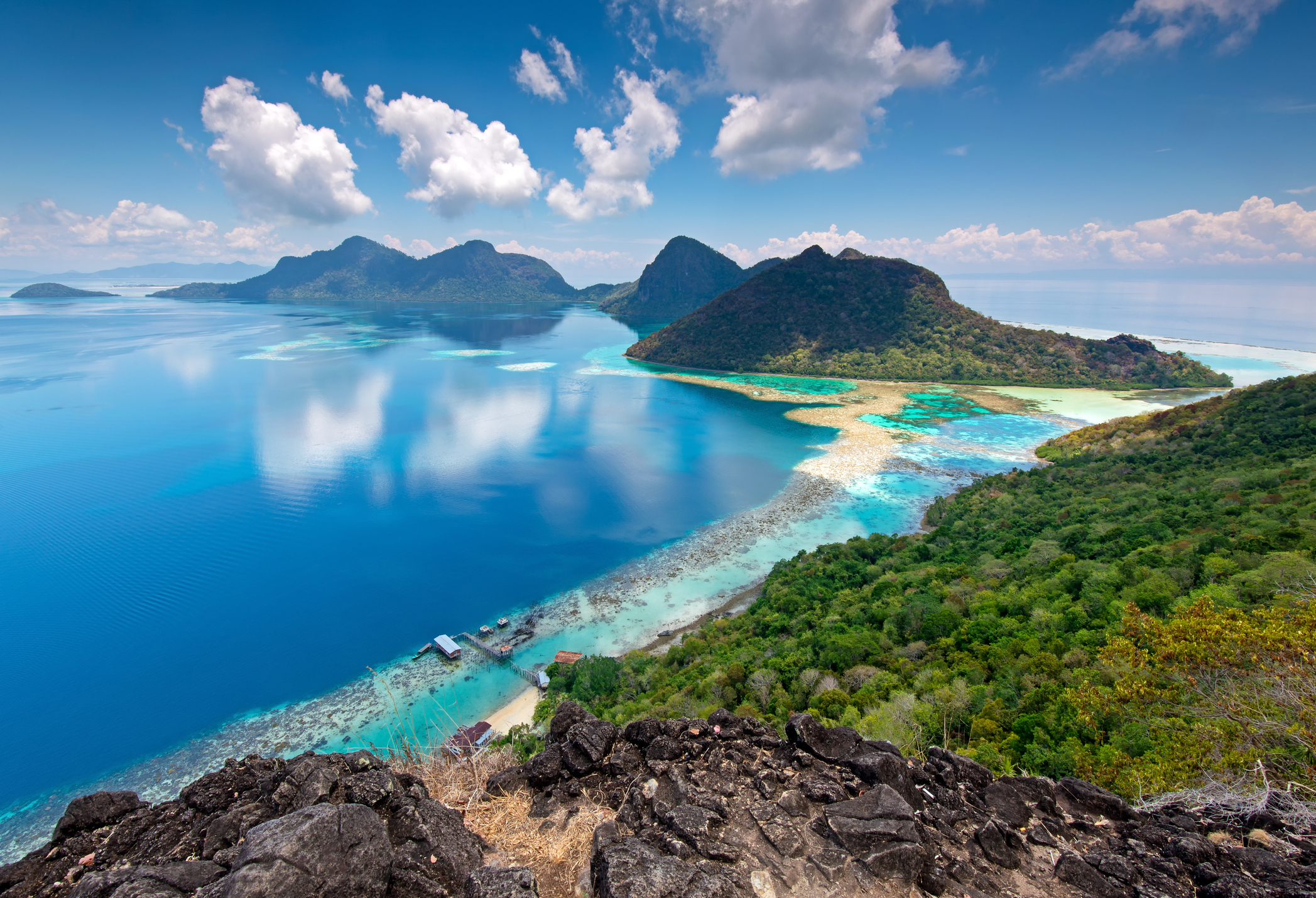 Bohey Dulang is a mountainous island formed by the remnants of an ancient volcano located at Celebes sea in the vicinity of Tun Sakaran marine park and Sipadan island.