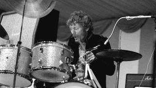 Cream’s Ginger Baker performing onstage in the 1960s