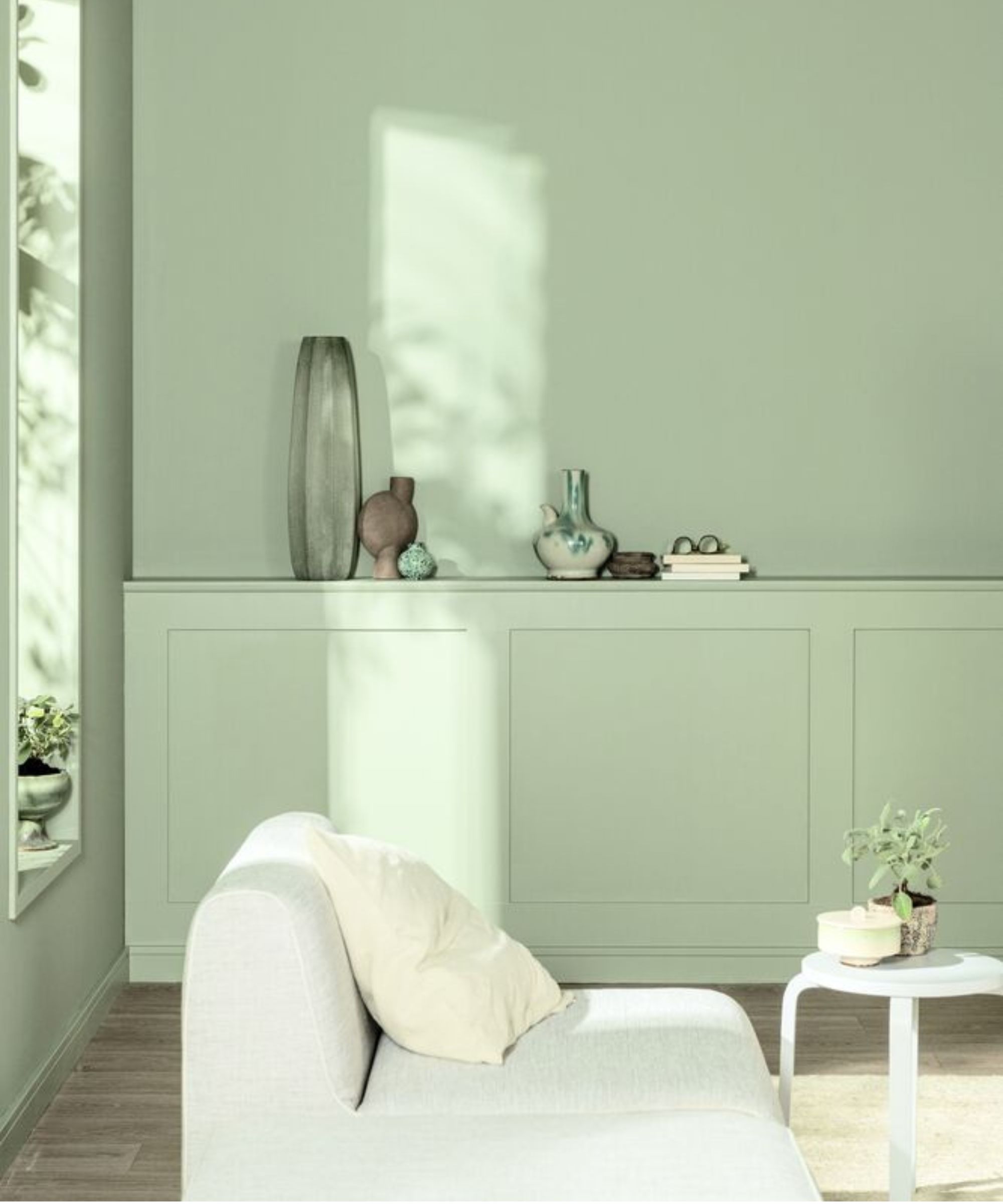 Corner of modern living room painted in Dulux Soulful sage
