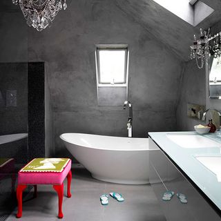 bathroom with wash basin white bath tub and stool