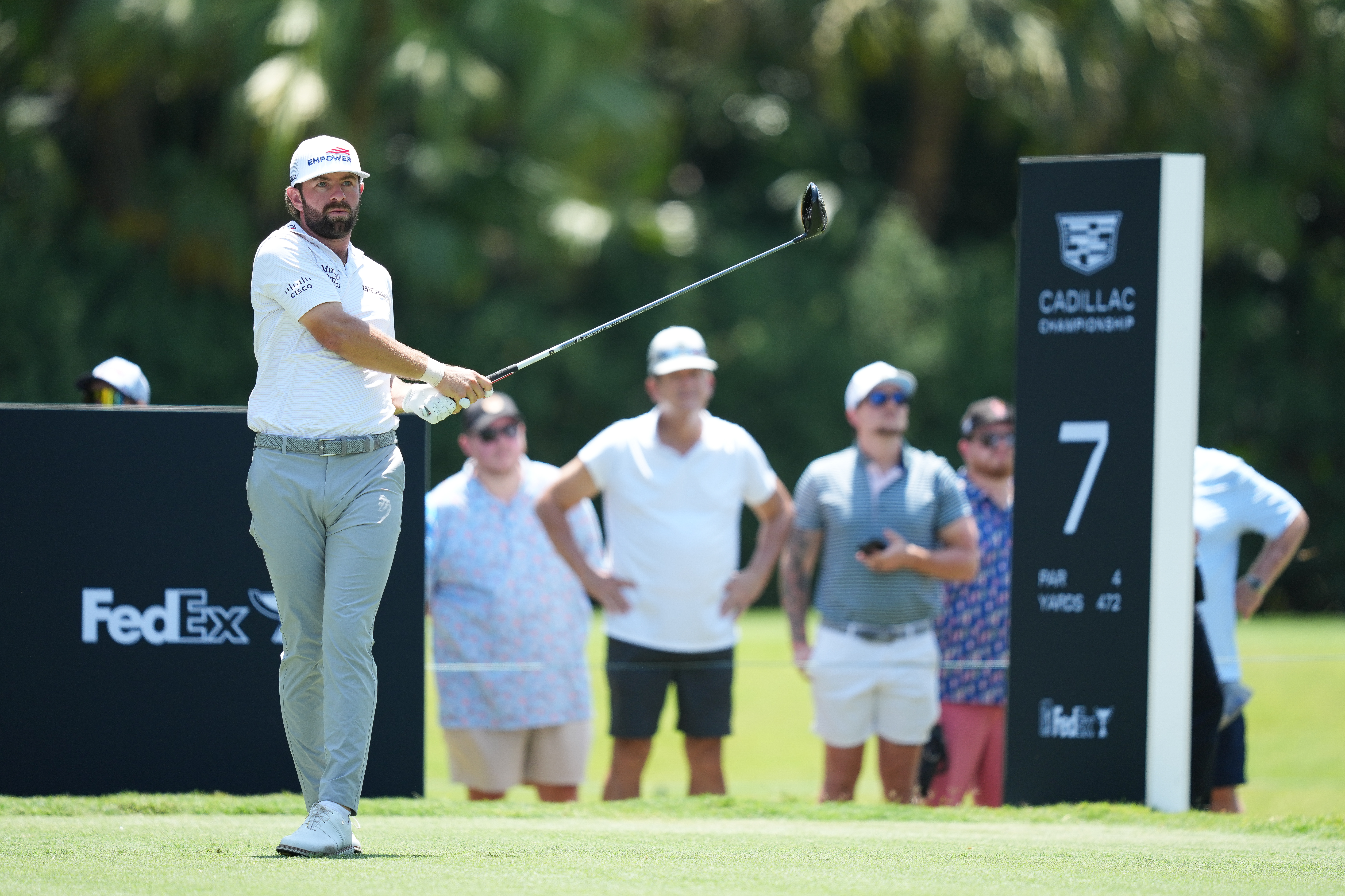 Cameron Young plays a tee shot on the seventh hole during the first round of Cadillac Championship at Trump National Doral - Blue Monster