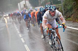 Tomas Vaitkus (Astana) heads the peloton on a wet day in Spain.