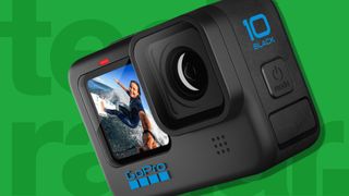 The GoPro Hero 10 Black, one of the best action cameras, on a green background