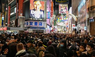 Crowds gather at Tokyo's Shibuya Crossing to celebrate the start of the New Year on December 31 2022. Japan's sharply declining birthrate is a growing political problem, and its Prime Minister, Fumio Kishida, has warned that the country may be unable to function if births do not rise.