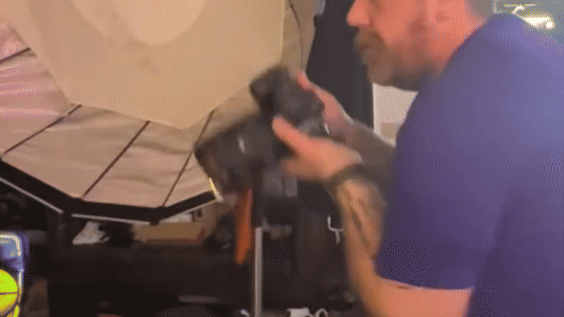 Short video clip showing front of lens engulfed in flames as photographer captures photo 