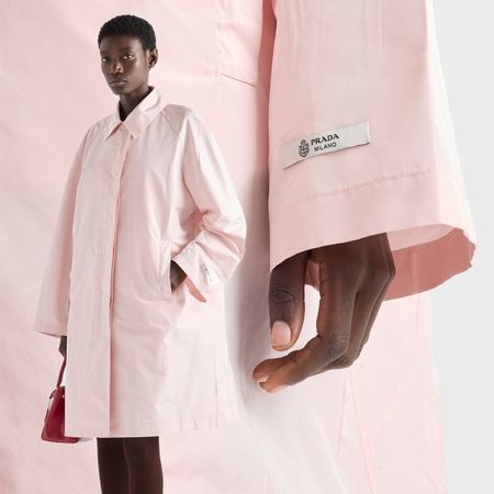 A collage of photos of a model wearing a pink Prada taffeta coat from the brand's holiday collection 2025.