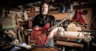 Seth Lee Jones in his workshop with a 1969 Gibson ES-345