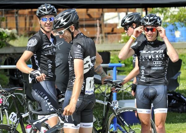 The Pure Black Racing team celebrate their first win.