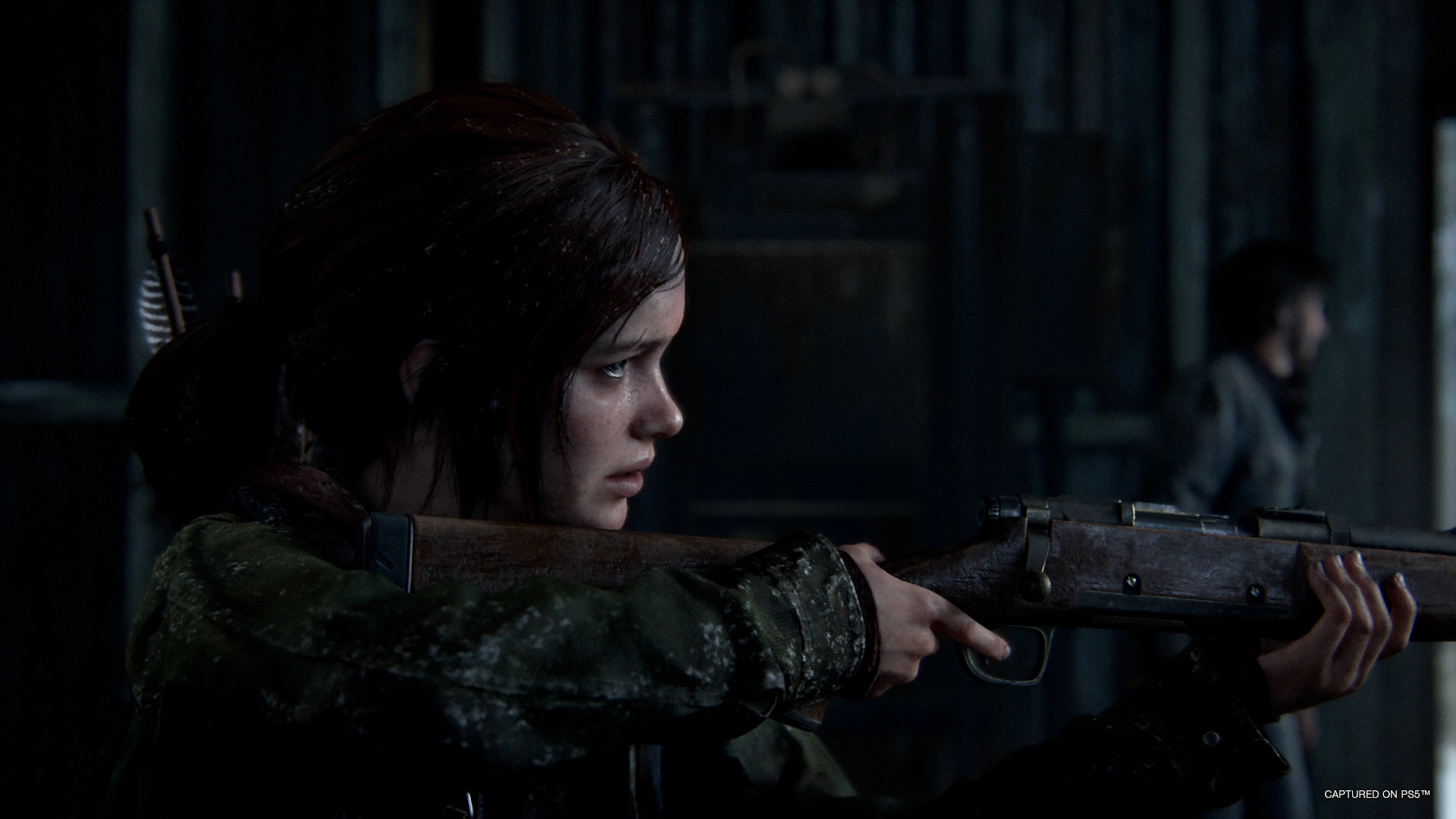 Ellie holding a gun during The Last of Us Part 1