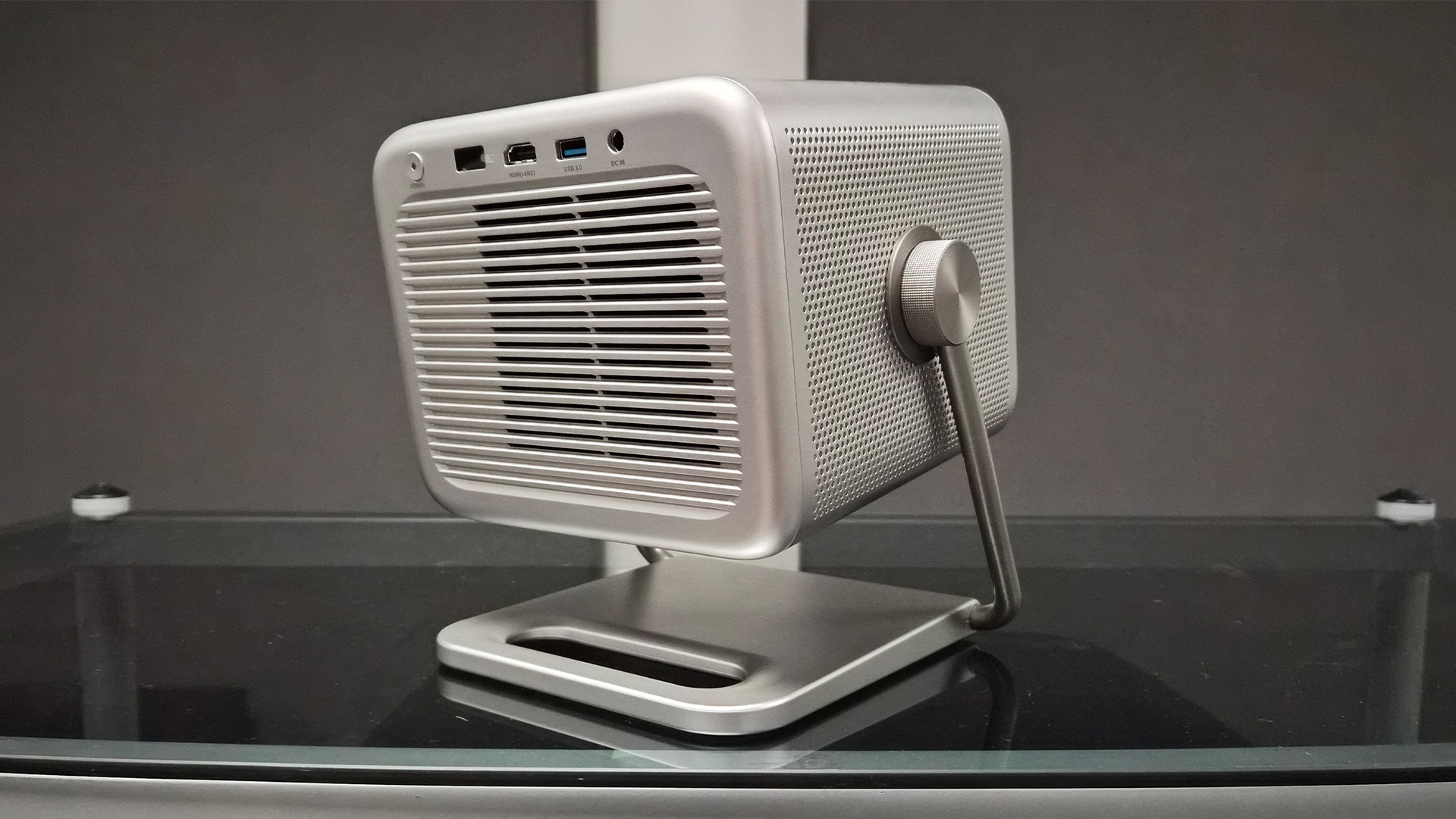 Hisense M2 Pro lifestyle projector, rear of projector on glass surface
