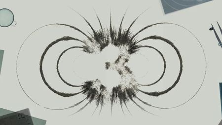 Kimi K3 logo showing a number '3' in iron filings