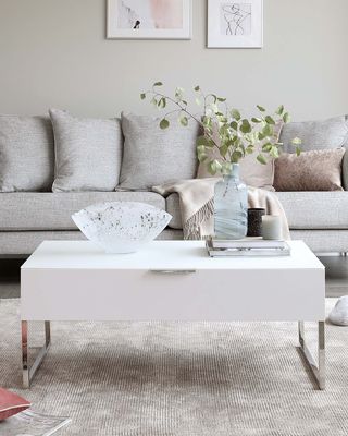 small living room with white coffee table