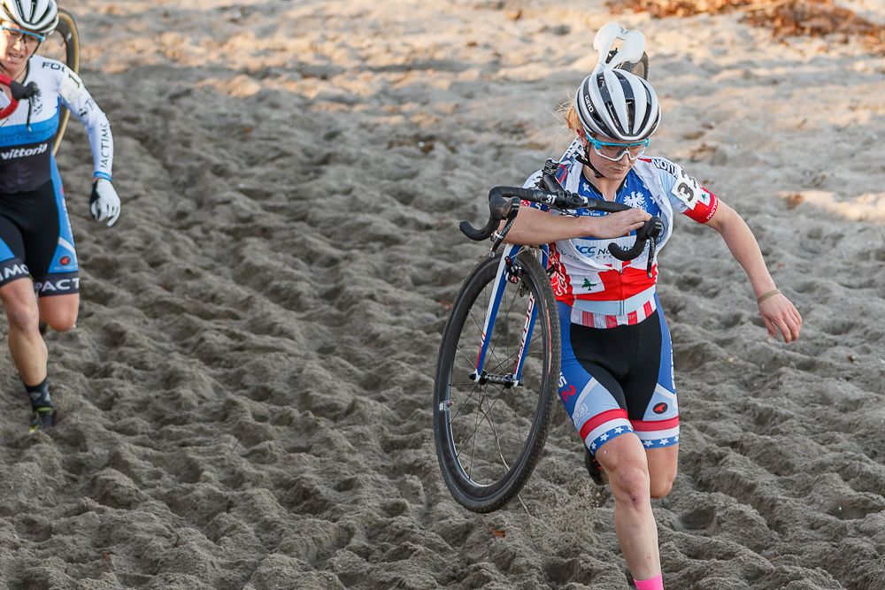 Noble runs through the beach section, chased by teammate Greaser