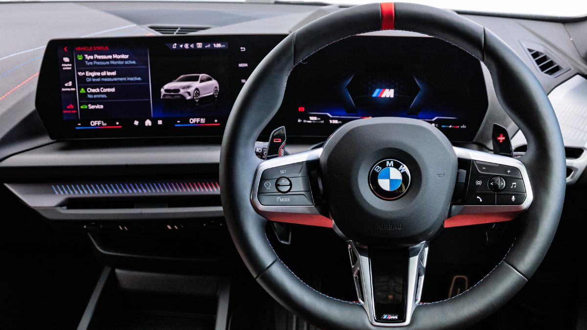 A BMW steering wheel and infotainment system