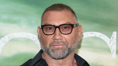 dave bautista on a green background