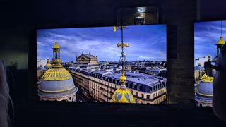 LG QNED93 with building rooftop on screen