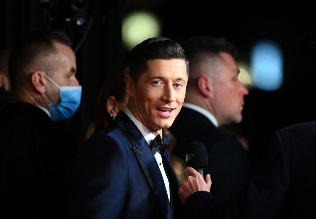 Polish forward Robert Lewandowski talks to the press upon his arrival to attend the 2021 Ballon d&amp;amp;apos;Or France Football award ceremony at the Theatre du Chatelet in Paris on November 29, 2021. (Photo by FRANCK FIFE / AFP) (Photo by FRANCK FIFE/AFP via Getty Images)