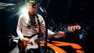 Mark Hoppus playing his Fender Jag bass on stage