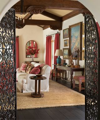Spanish Colonial living room with red upholstery