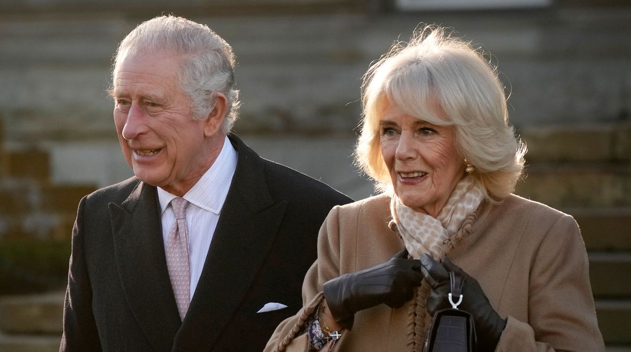 King Charles III and Camilla, Queen Consort leave Bolton Town Hall during a tour of Greater Manchester on January 20, 2023 in Bolton, United Kingdom.