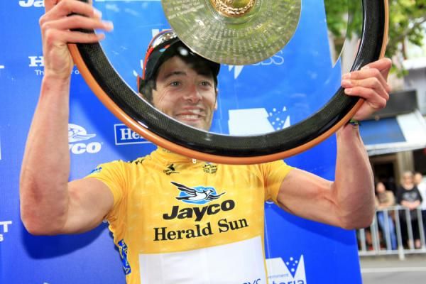 Genesys Wealth Advisers' Nathan Haas holds the 2011 Jayco Herald Sun Tour trophy aloft