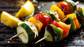 Vegetable skewers on barbecue