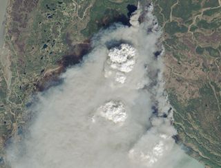 A natural-color image of Alaska's Funny River fire captured on May 21, 2014.